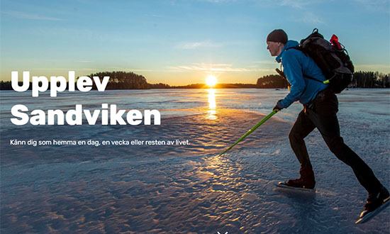 Skridskoåkare på Storsjön - text i bilden: Upplev Sandviken. Känn dig som hemma!